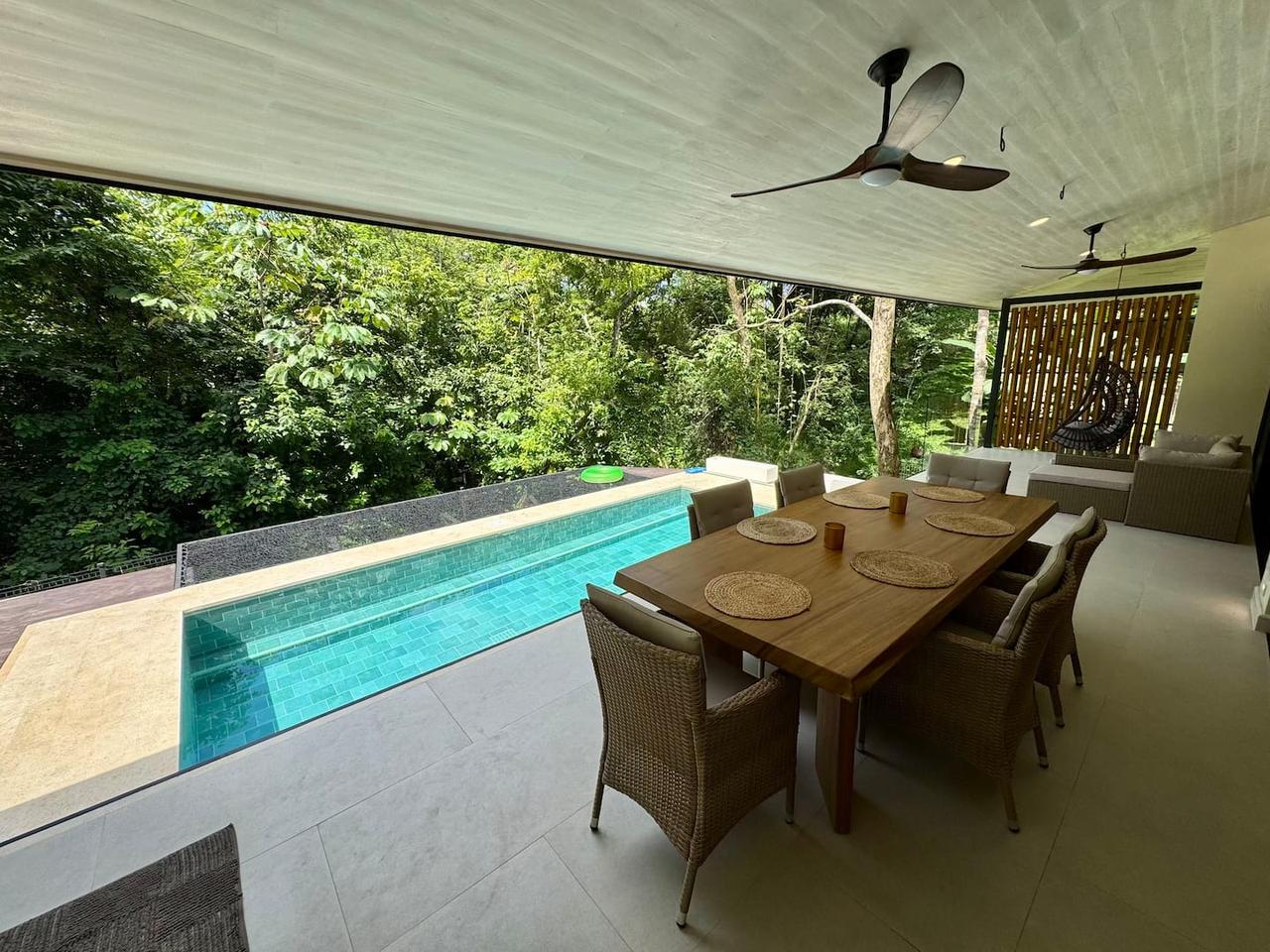 Outdoor dining table beside the pool